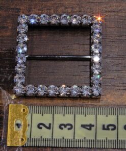 Alternative view of Τόκα μεταλλική με στράς 3cm κωδ.190